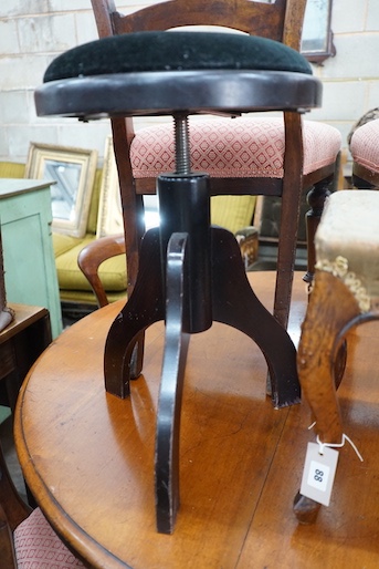 A Victorian rosewood footstool, width 32cm, height 36cm and a contemporary ebonised adjustable piano stool